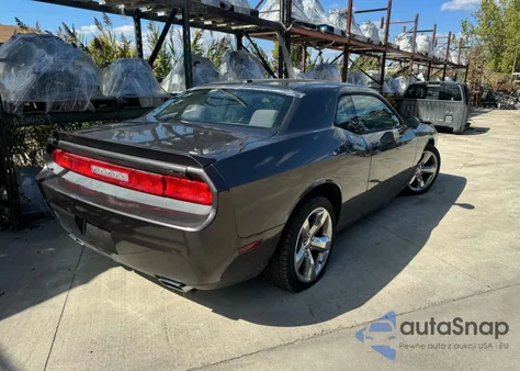 2014 Dodge Challenger Sxt z USA, uszkodzony, nr VIN 2C3CDYAG9EH133472